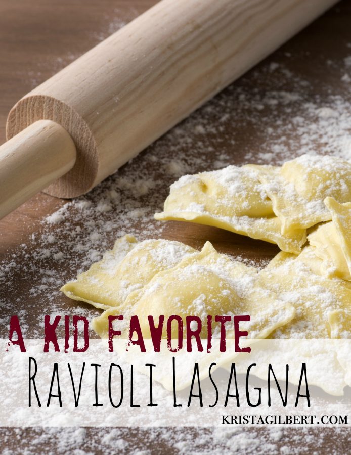 homemade uncooked ravioli with a roller on wooden table
